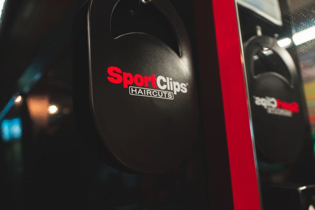 sport clips haircuts logo social media marketing